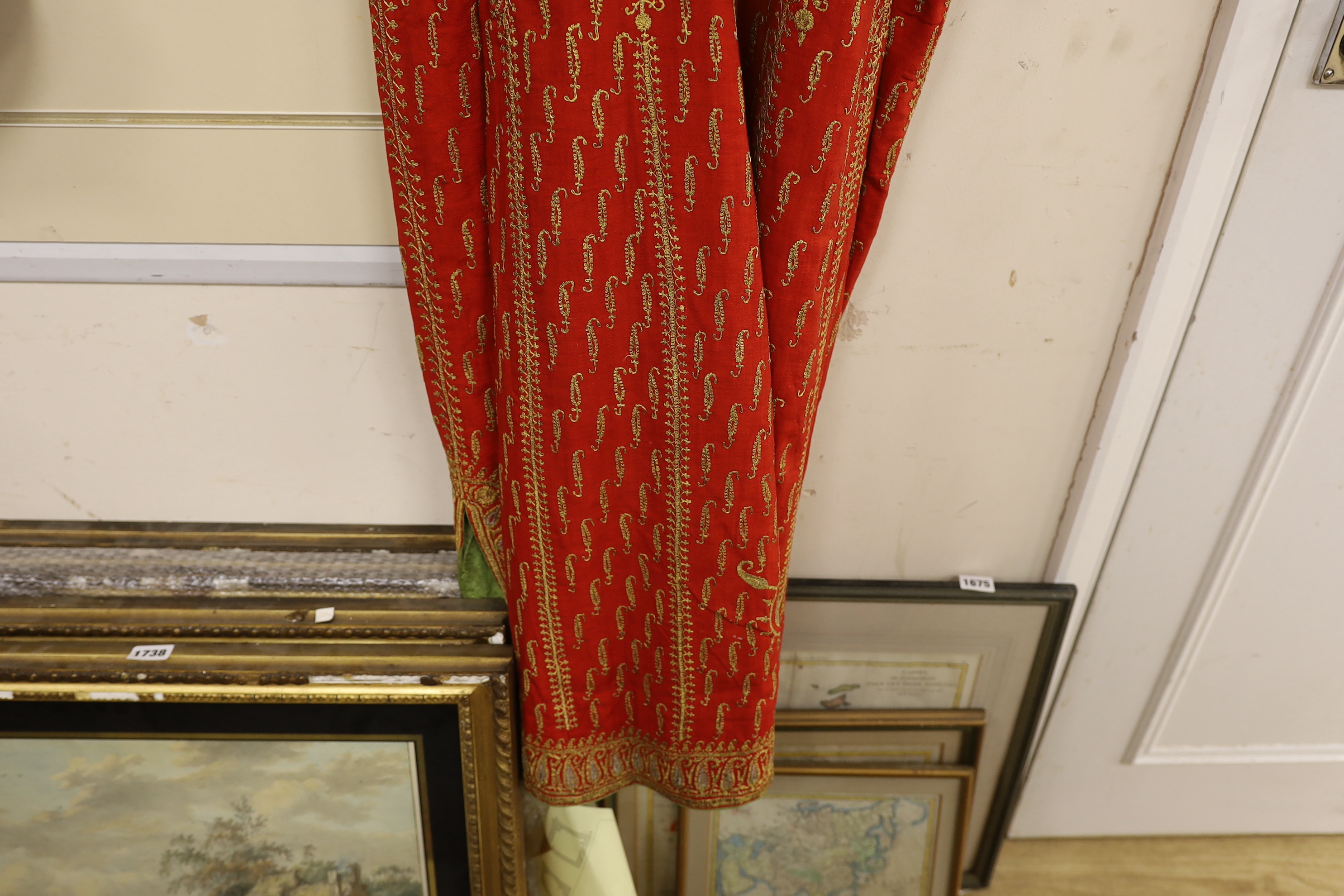 A 19th century fine wool coat, embroidered with gold and silver coloured metal threads in an all over paisley design